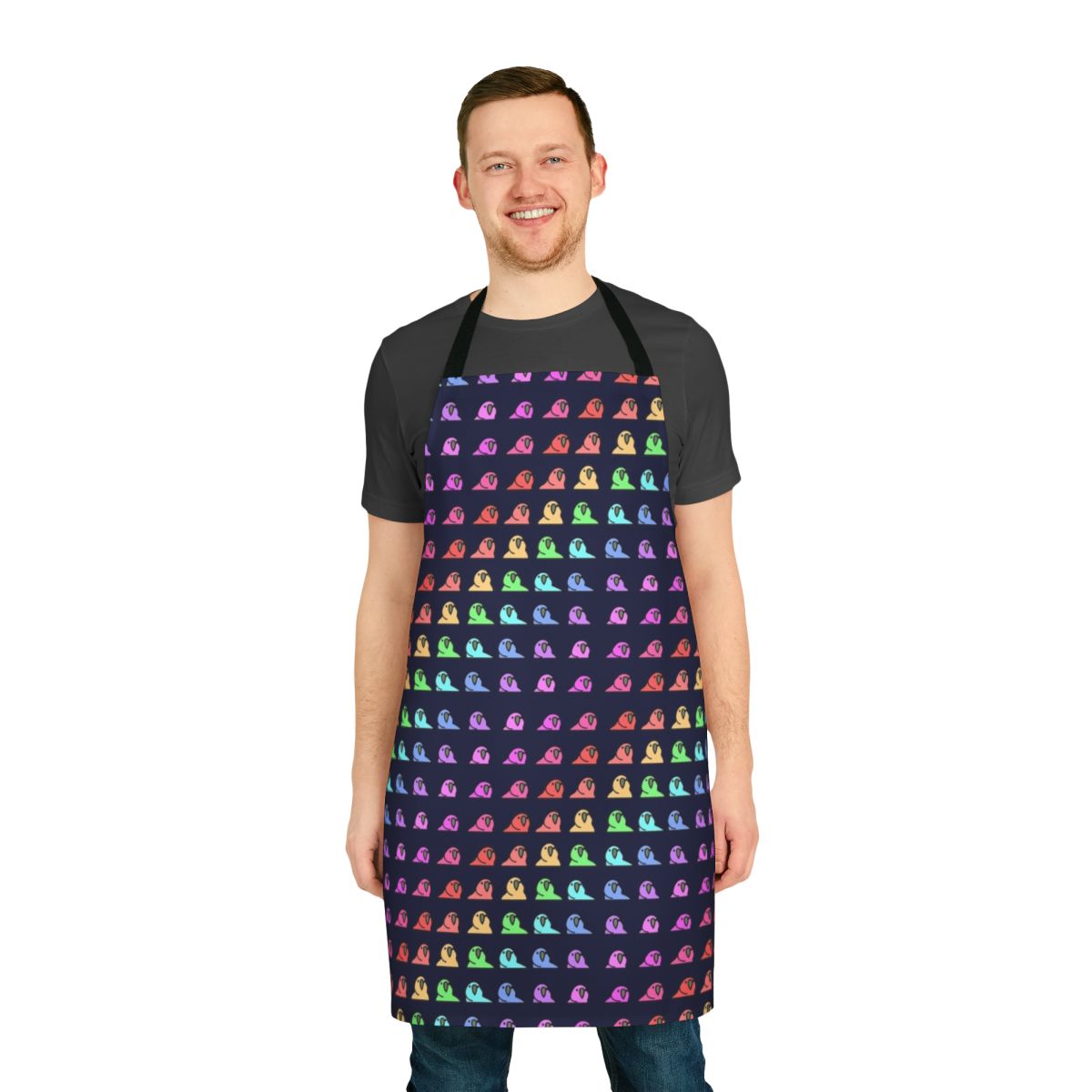 A colorful apron featuring a vibrant rainbow parrot design