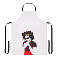 A vibrant red apron featuring a bold flower design, inspired by the music of artist Goldfrapp.