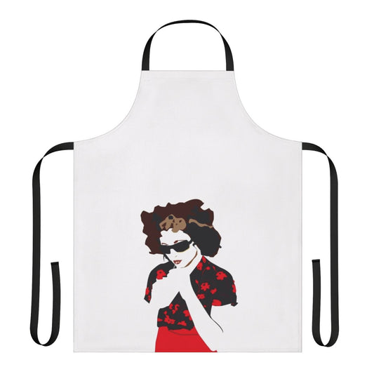 A vibrant red apron featuring a bold flower design, inspired by the music of artist Goldfrapp.
