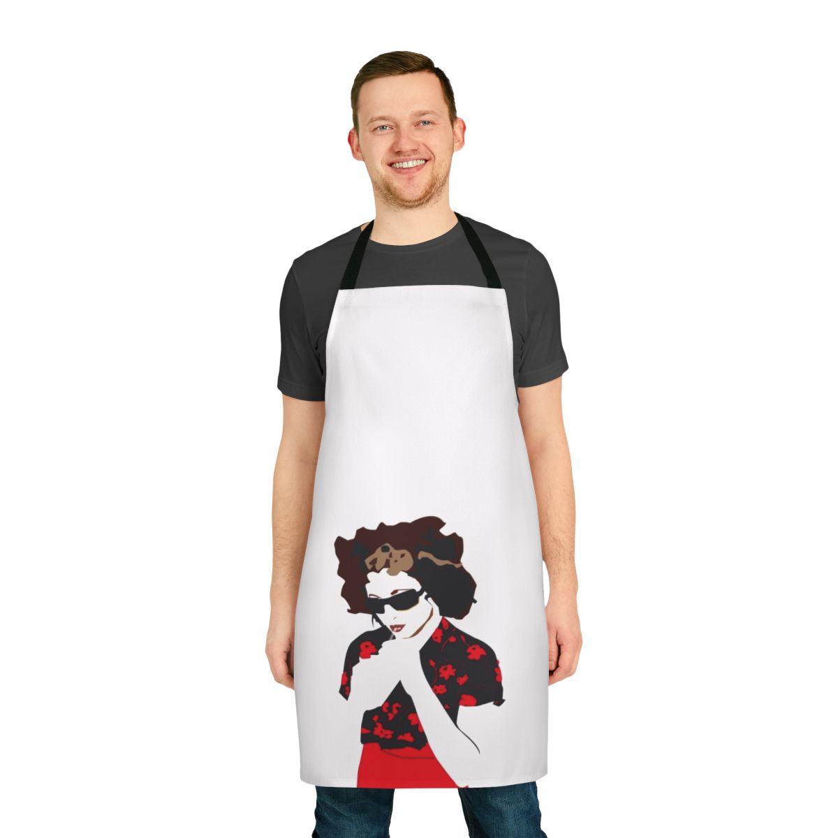 A vibrant red apron featuring a bold flower design, inspired by the music of artist Goldfrapp.