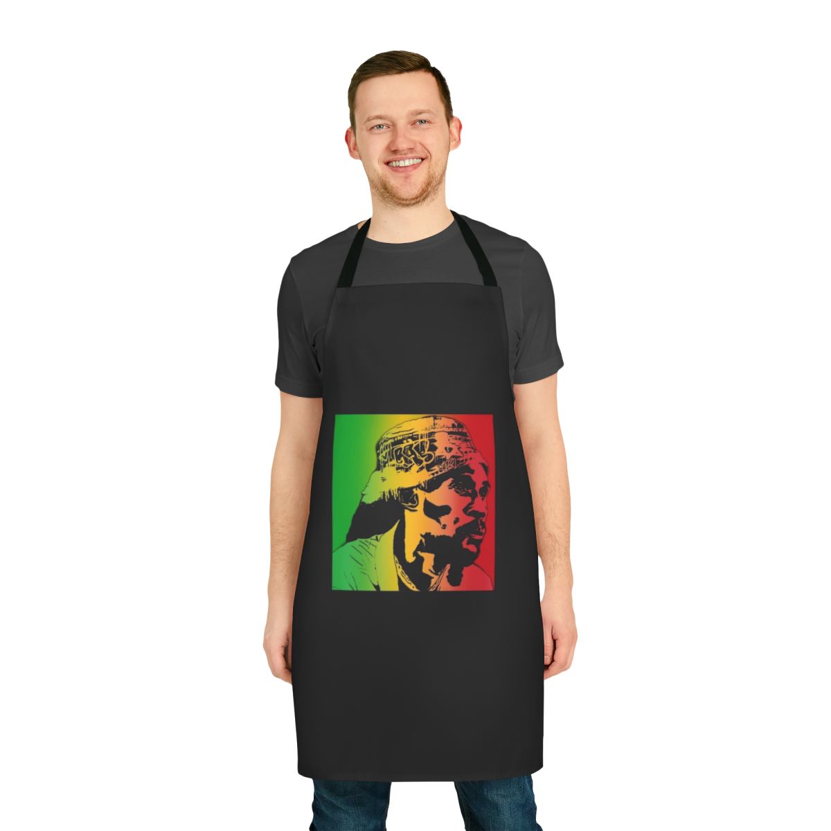 Reggae-inspired apron featuring Vaughn Benjamin's iconic artwork and Rastafarian colors