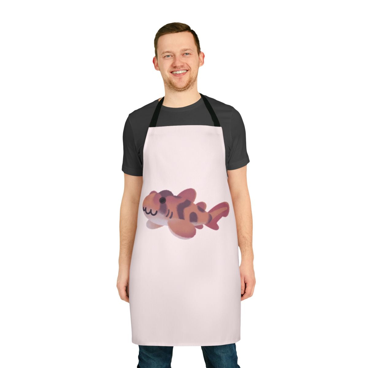 A colorful apron featuring an array of whimsical shark and marine life illustrations.