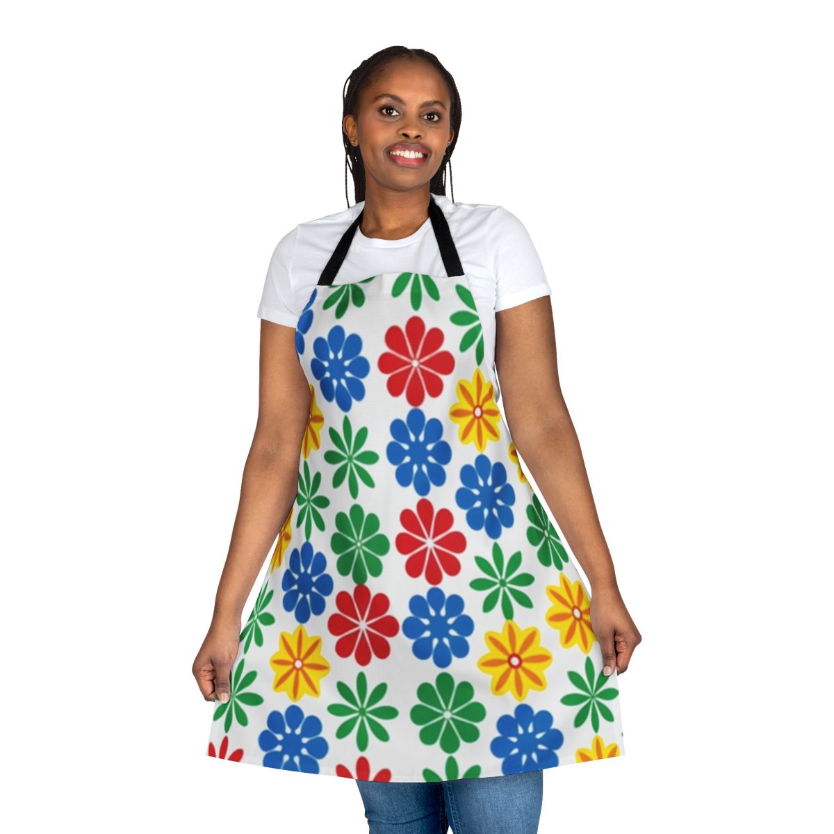 A colorful apron featuring a vintage-inspired floral pattern in shades of yellow, blue, and green.