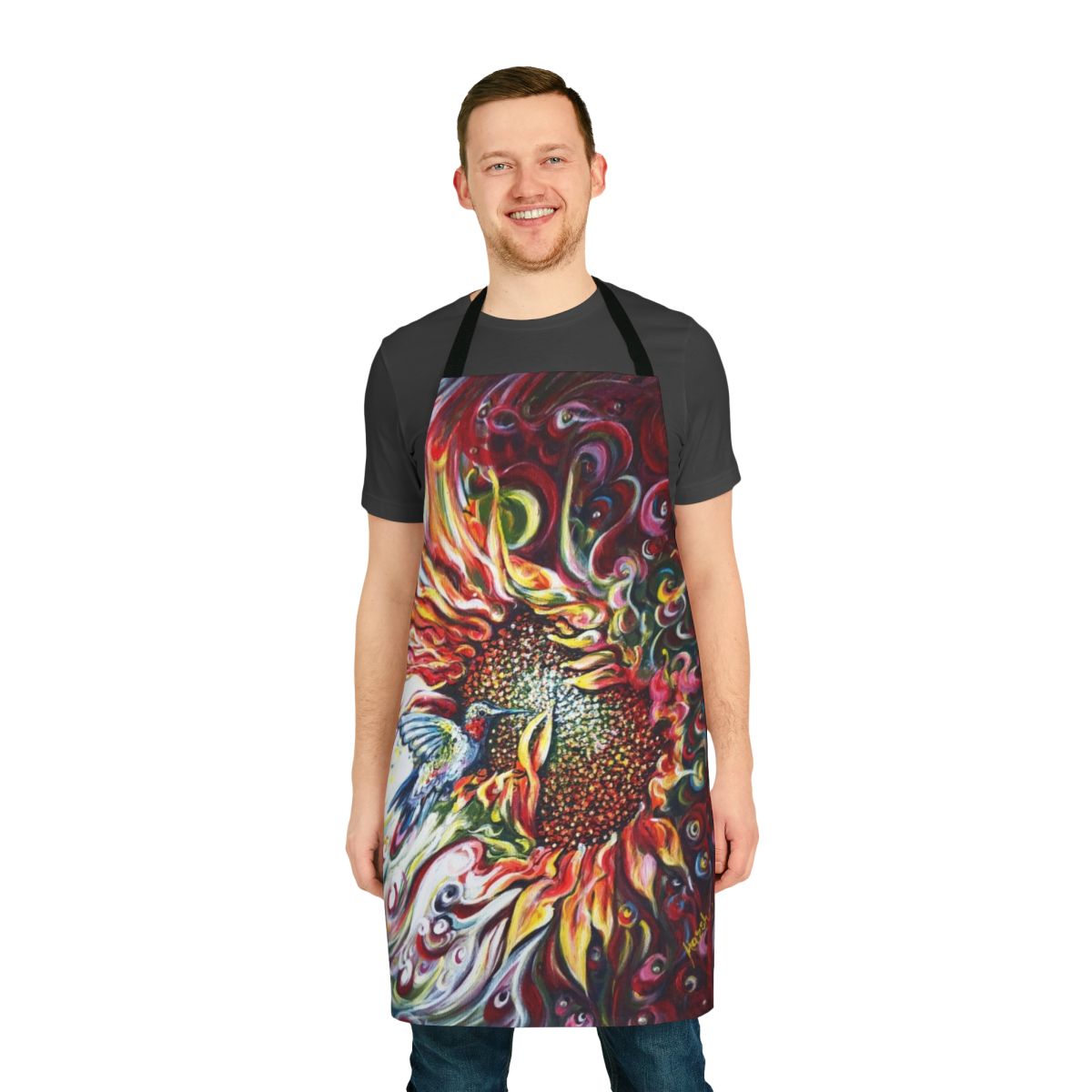 Sunflower and hummingbird design on a colorful floral apron