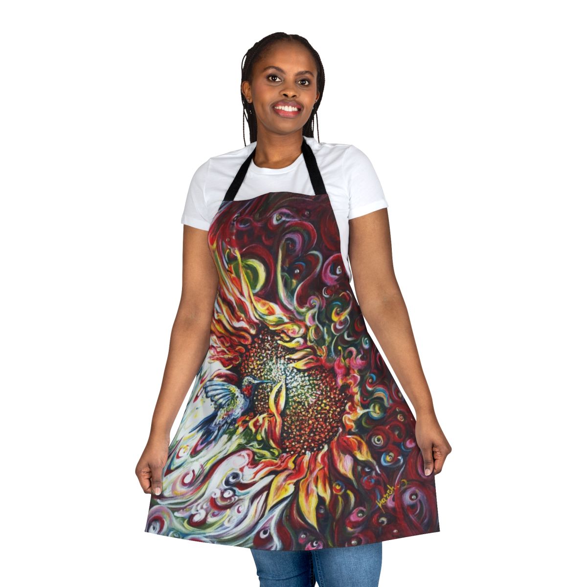 Sunflower and hummingbird design on a colorful floral apron