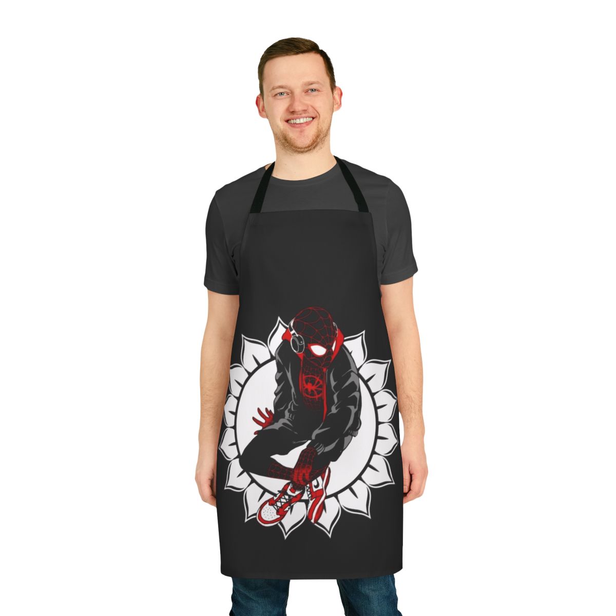 White apron with sunflower and spider web design, perfect for superhero-inspired cooking and crafting.
