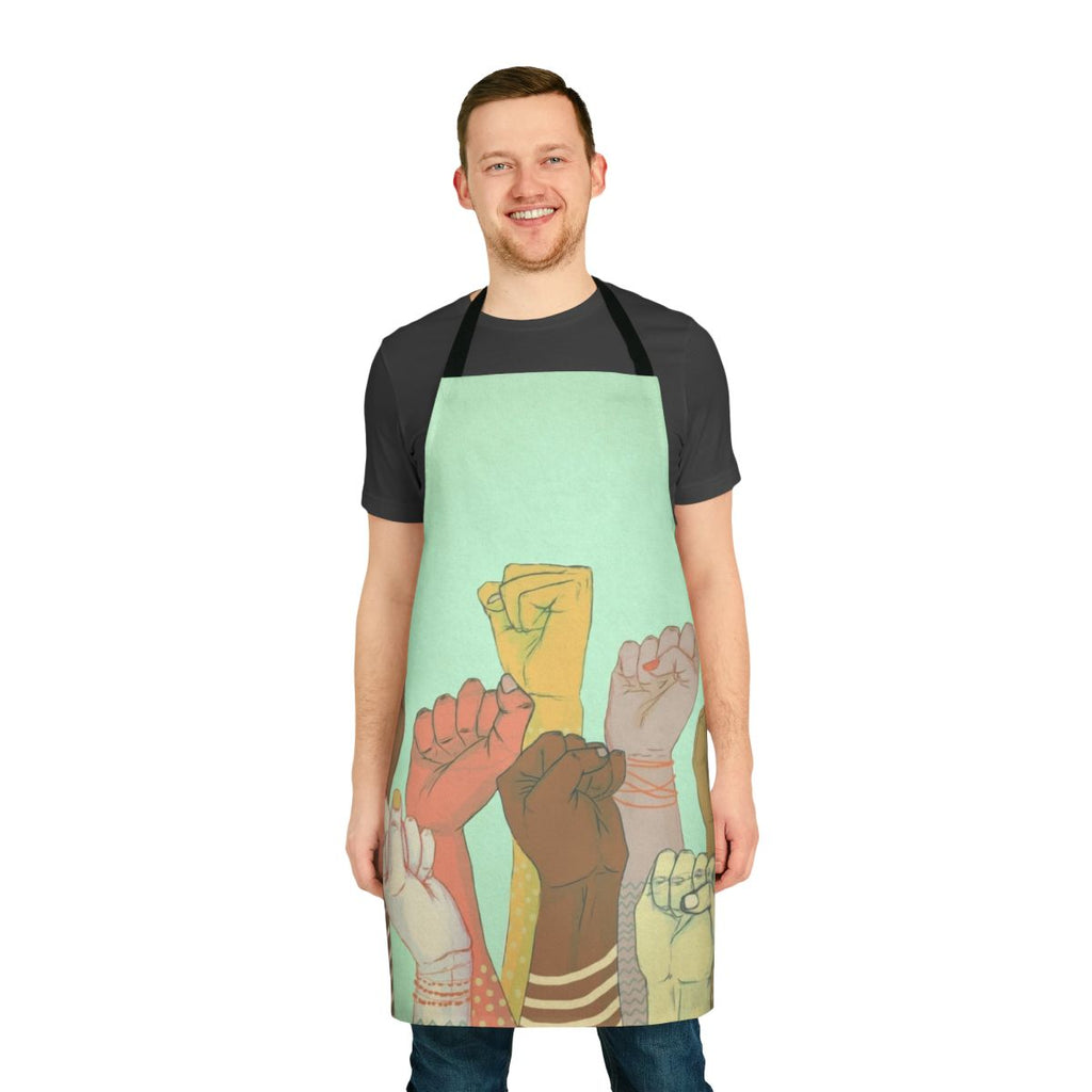 Colorful apron featuring a pattern of diverse hands and fists, symbolizing unity and community.