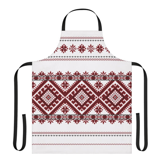 A traditional Romanian-inspired apron featuring a bold geometric motif in red and black.