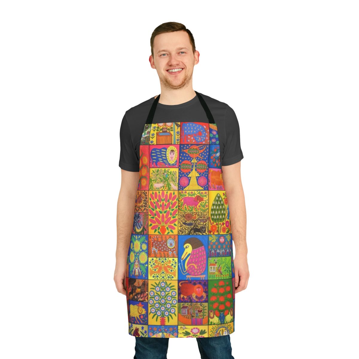 Colorful apron featuring the distinctive folk art paintings of renowned Ukrainian artist Maria Pryimachenko
