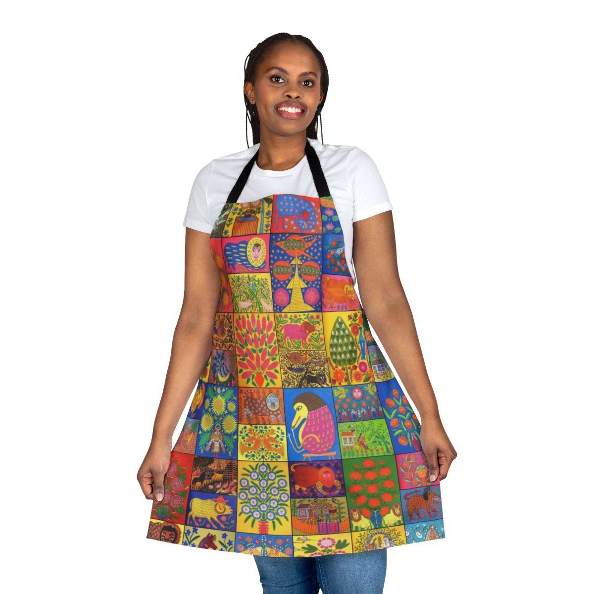 Colorful apron featuring the distinctive folk art paintings of renowned Ukrainian artist Maria Pryimachenko