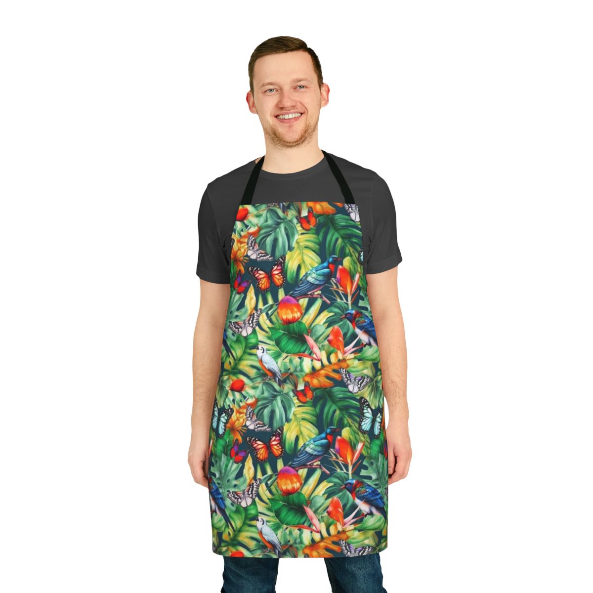 Watercolor jungle-themed apron with tropical birds, flowers, and monstera leaves