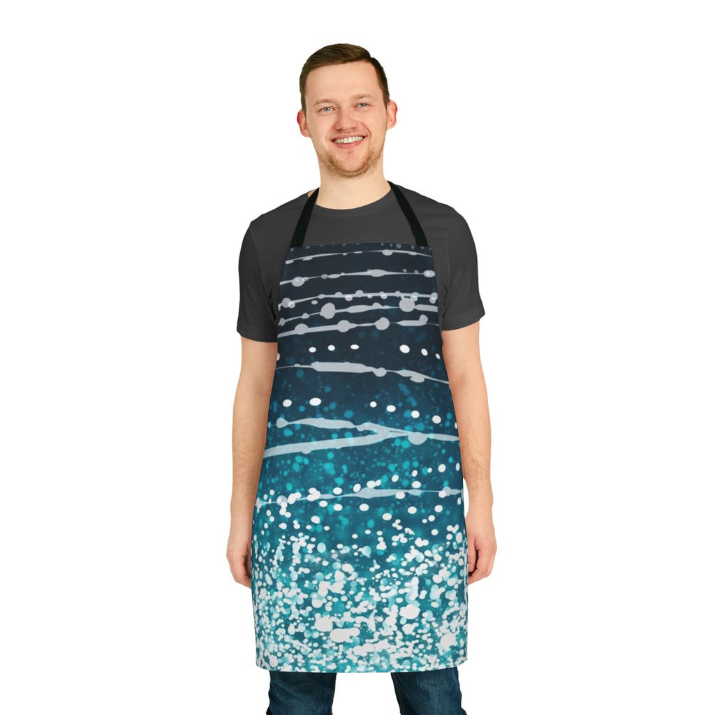 Photograph of an apron featuring a vibrant whale shark pattern in shades of blue, green, and white.