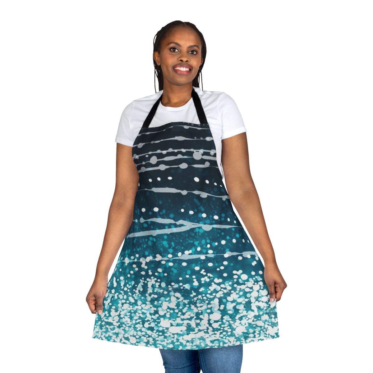 Photograph of an apron featuring a vibrant whale shark pattern in shades of blue, green, and white.