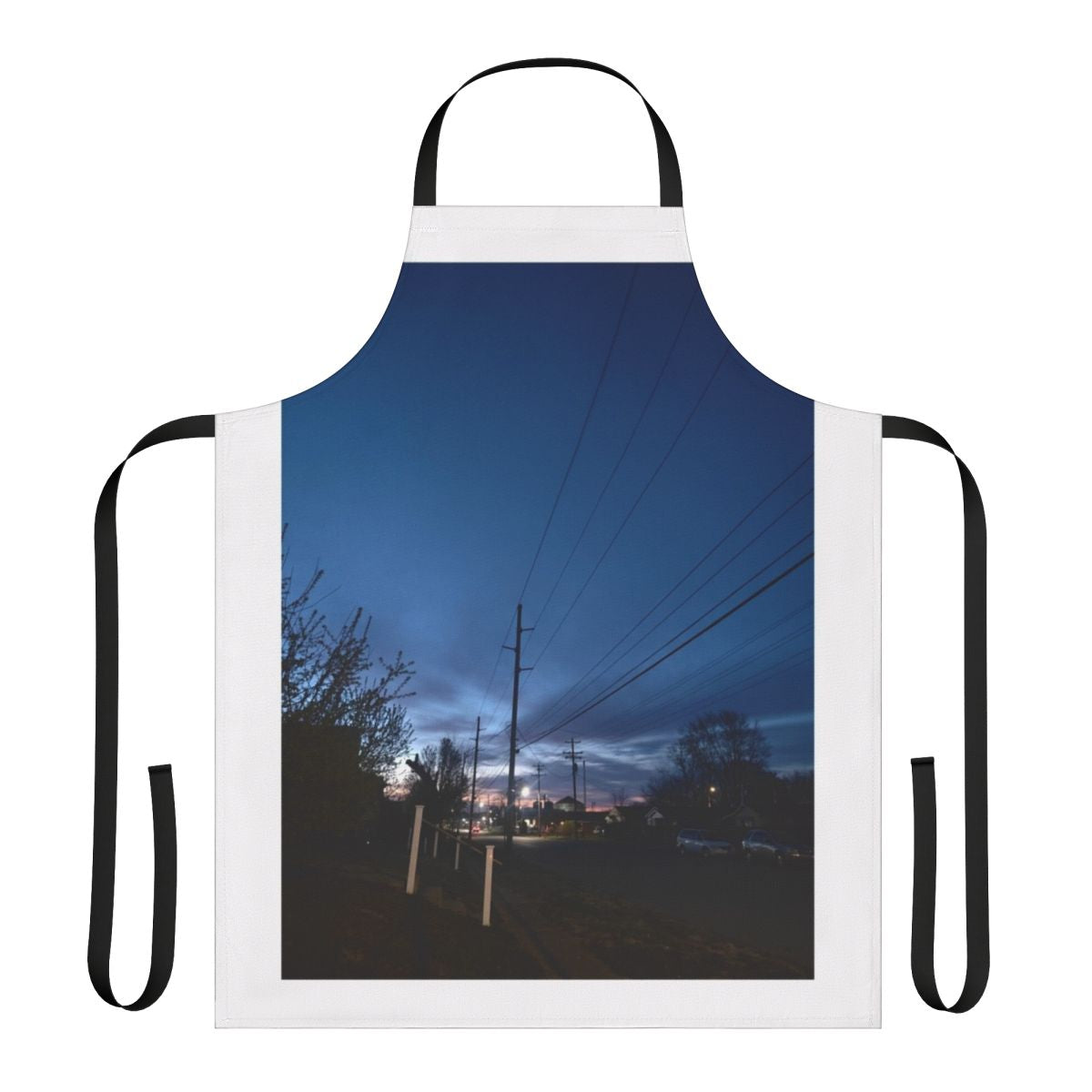 A colorful apron featuring a serene winter sunrise landscape