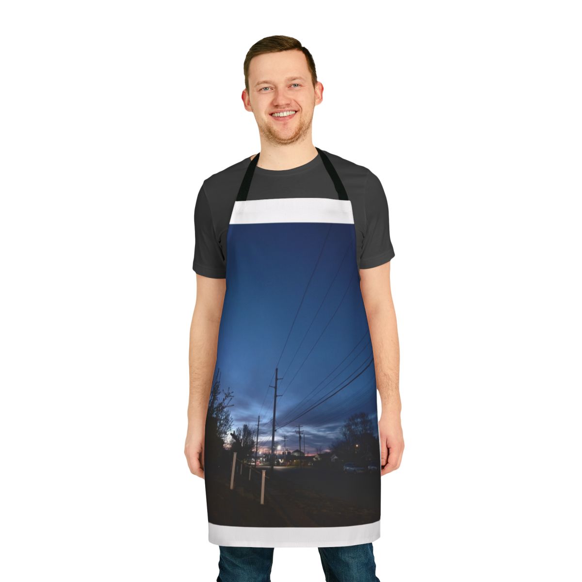 A colorful apron featuring a serene winter sunrise landscape