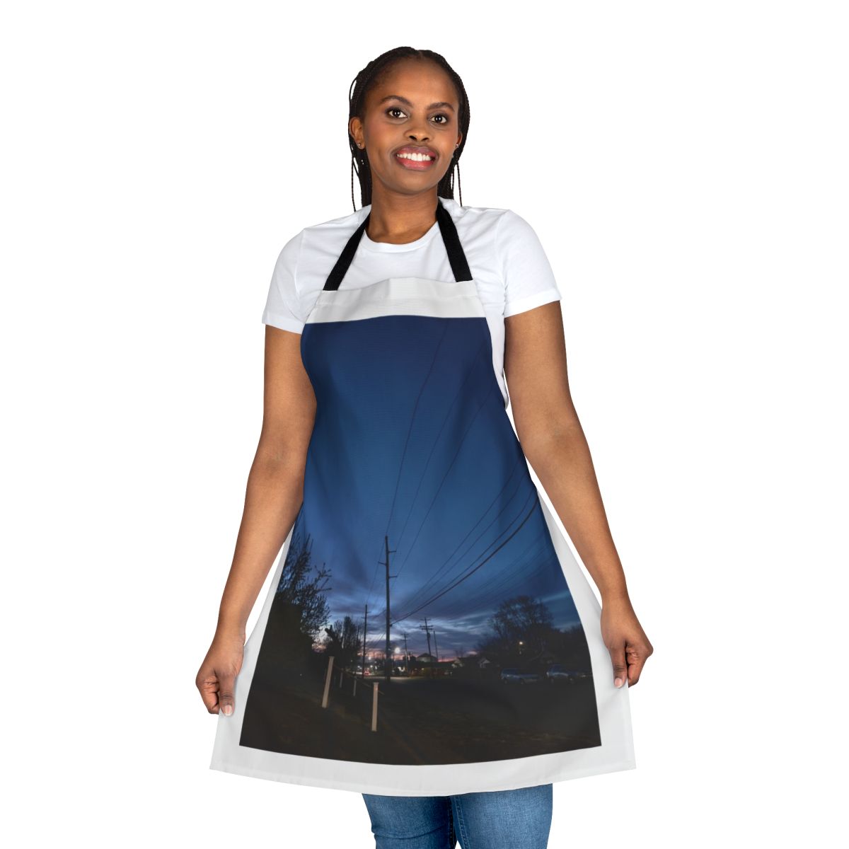 A colorful apron featuring a serene winter sunrise landscape