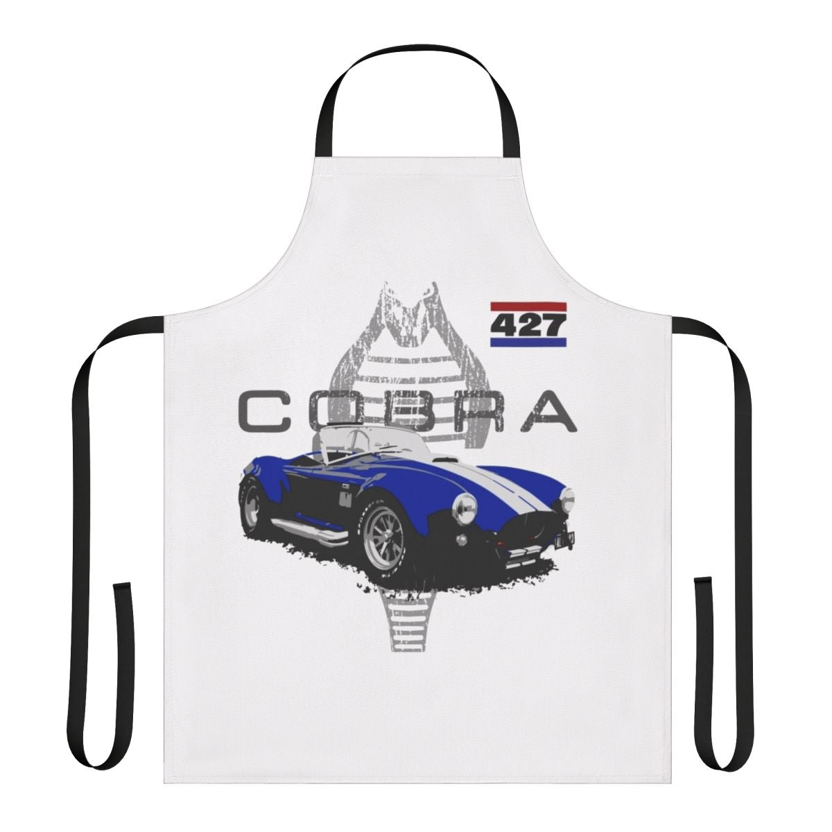 Vintage car enthusiast wearing a retro-styled apron with an AC Cobra graphic