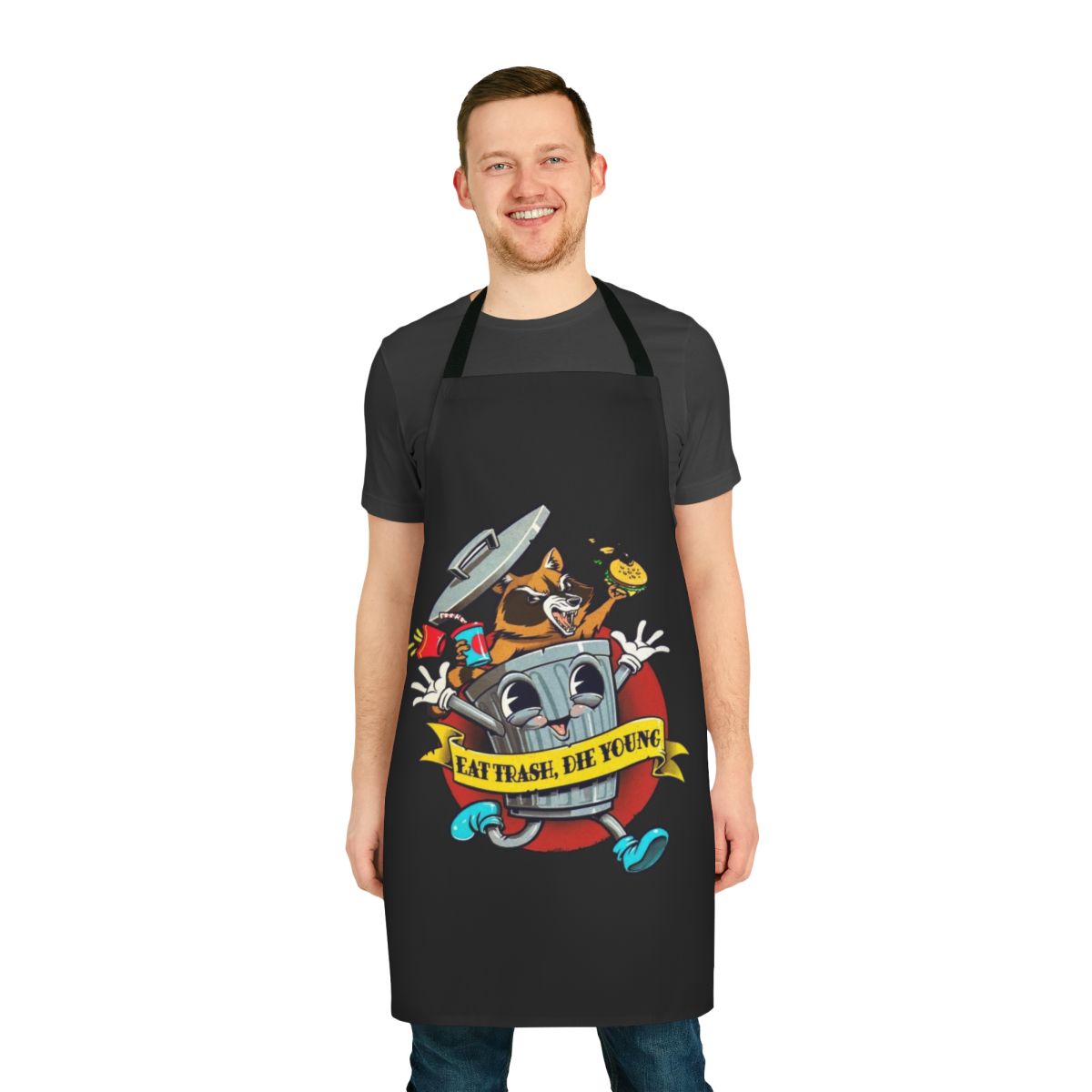 Vintage cartoon apron featuring a raccoon, trash can, and the text "Eat Trash Die Young"