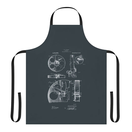 A vintage-inspired apron featuring patent drawings of a 1915 film reel camera.