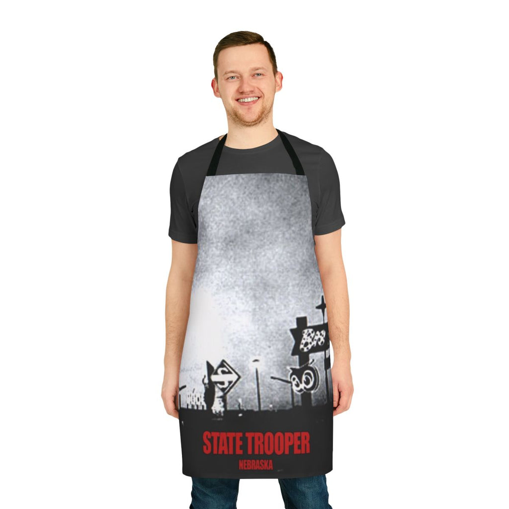 Vintage-inspired apron featuring a state trooper design, perfect for music fans and Nebraskans.