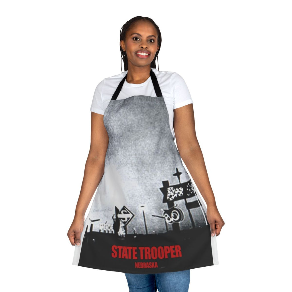 Vintage-inspired apron featuring a state trooper design, perfect for music fans and Nebraskans.