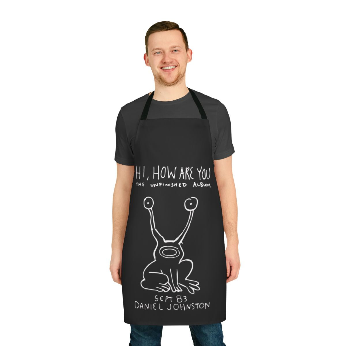 Vintage-style apron featuring the artwork and logo of 90s indie musician Daniel Johnston