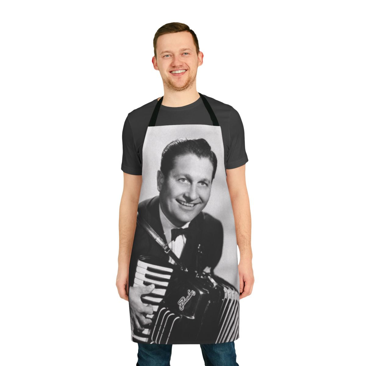 Vintage-style black and white apron featuring a smiling Lawrence Welk playing the accordion