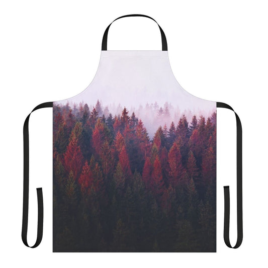 A vintage-style apron featuring a serene nature landscape with trees, fog, and mountains