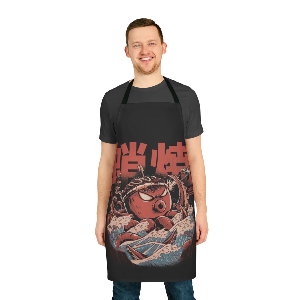 Vintage-inspired black apron with takoyaki, kaiju, and wave motifs