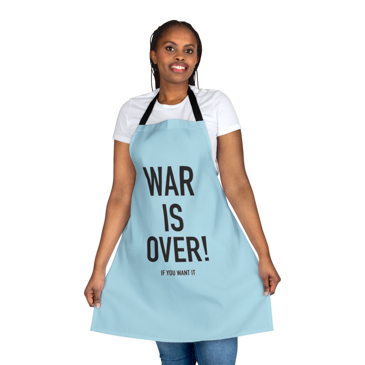 "Vintage-inspired 'War Is Over' apron featuring Yoko Ono and John Lennon's iconic imagery"