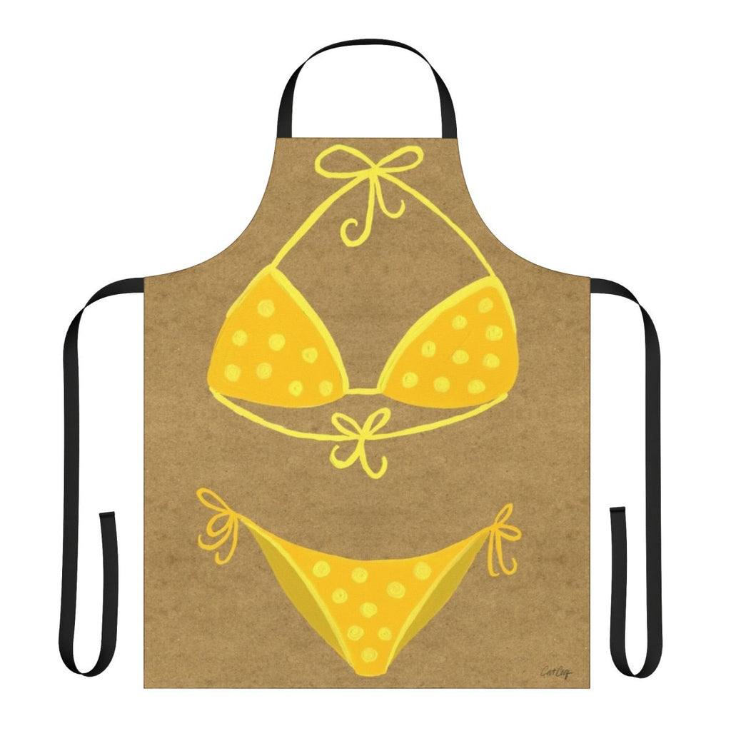 Vintage-style yellow and white polka dot bikini printed on a kraft apron