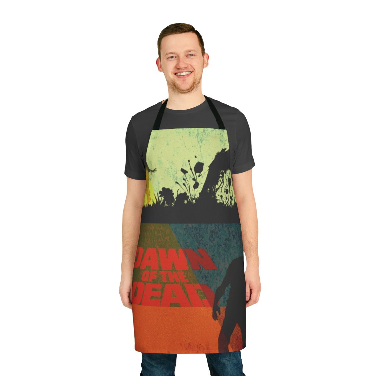 Vintage modern style apron with a horror movie theme, featuring zombies and the "Dawn of the Dead" movie logo.