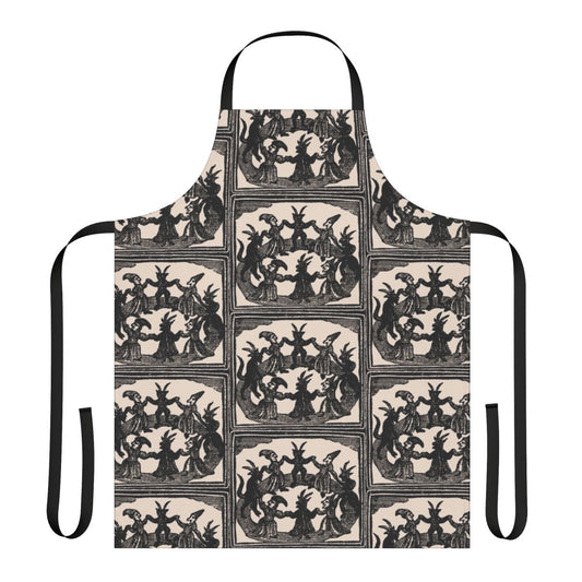 Vintage-style apron featuring a woodcut-inspired design of witches dancing in a circle.