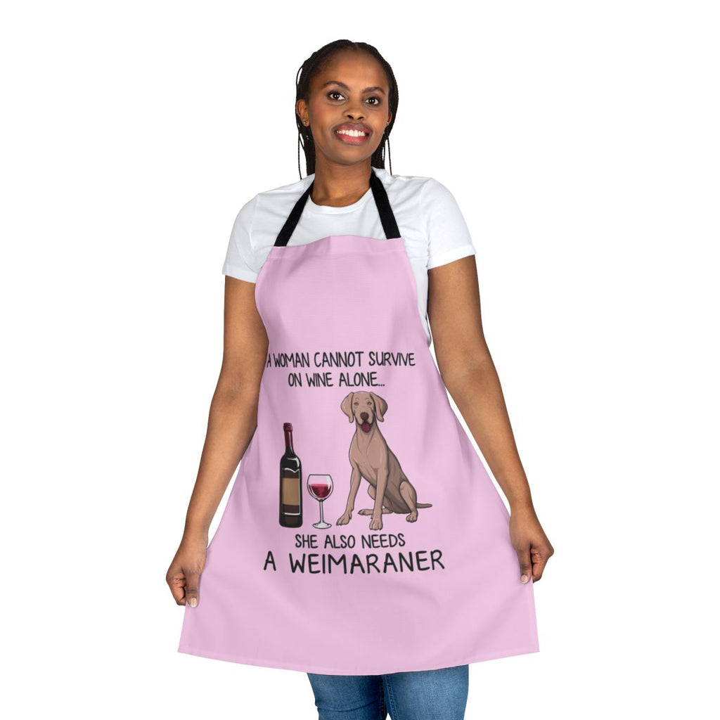 Weimaraner dog wearing an apron with the text "Weimaraner and Wine" on it