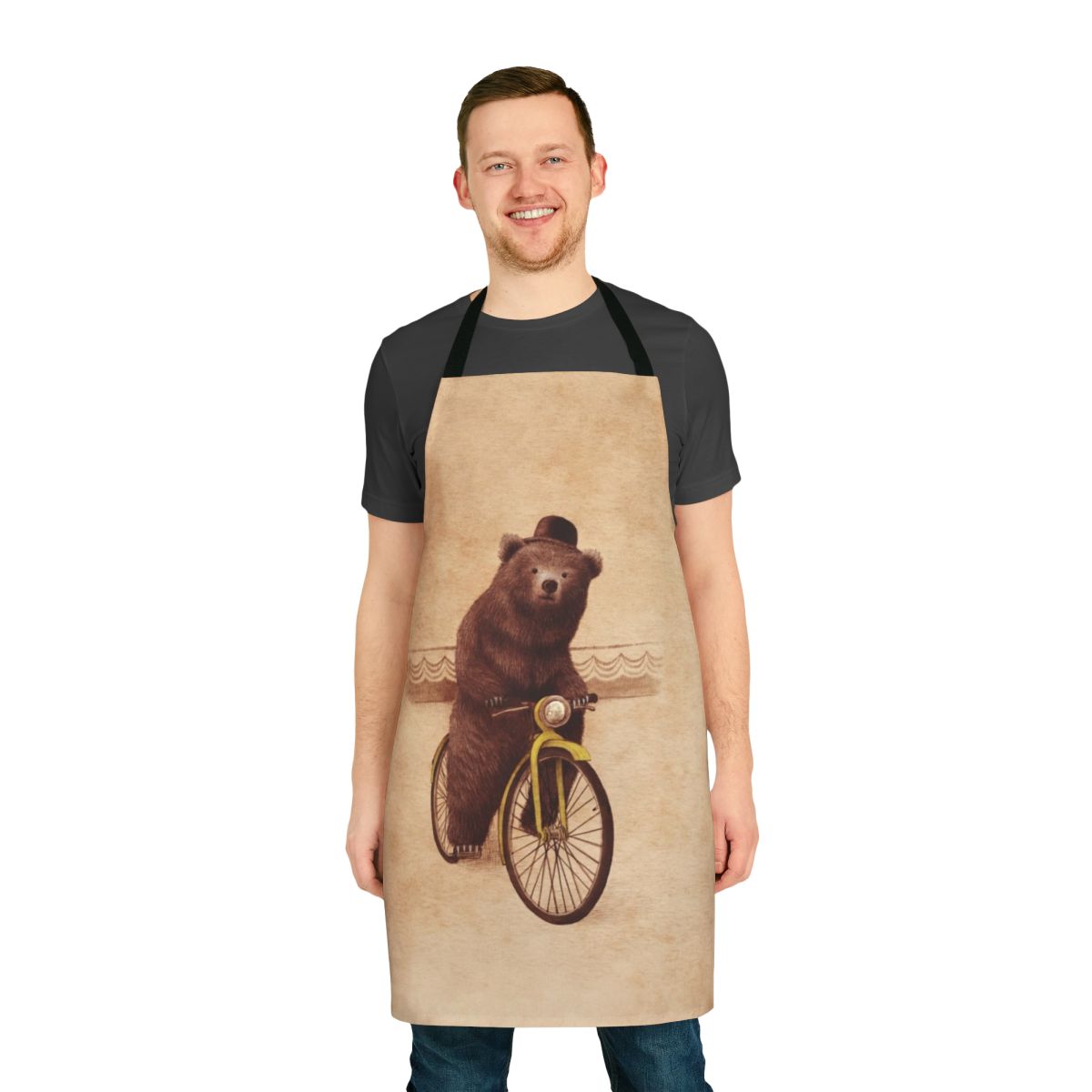 Whimsical and vintage-inspired illustration of a brown bear wearing a bowler hat and riding a bicycle, printed on a high-quality apron.