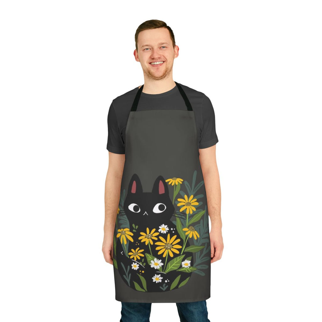 A black cat with flowers in a botanical, whimsical design on a high-quality apron