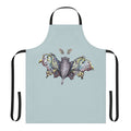 Whimsical butterbat apron featuring a mythical creature design in a pop surrealism style