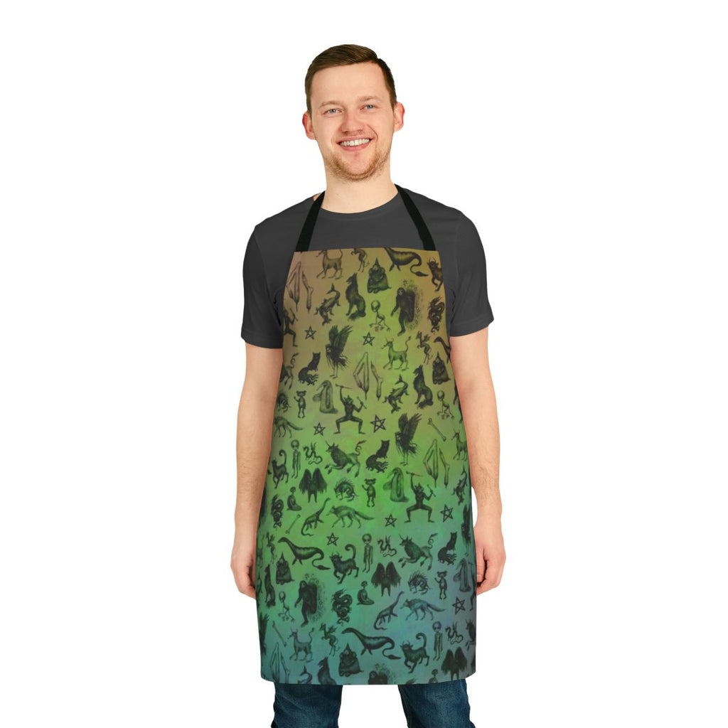 A colorful apron featuring a whimsical design of mythical cryptids and magical creatures.