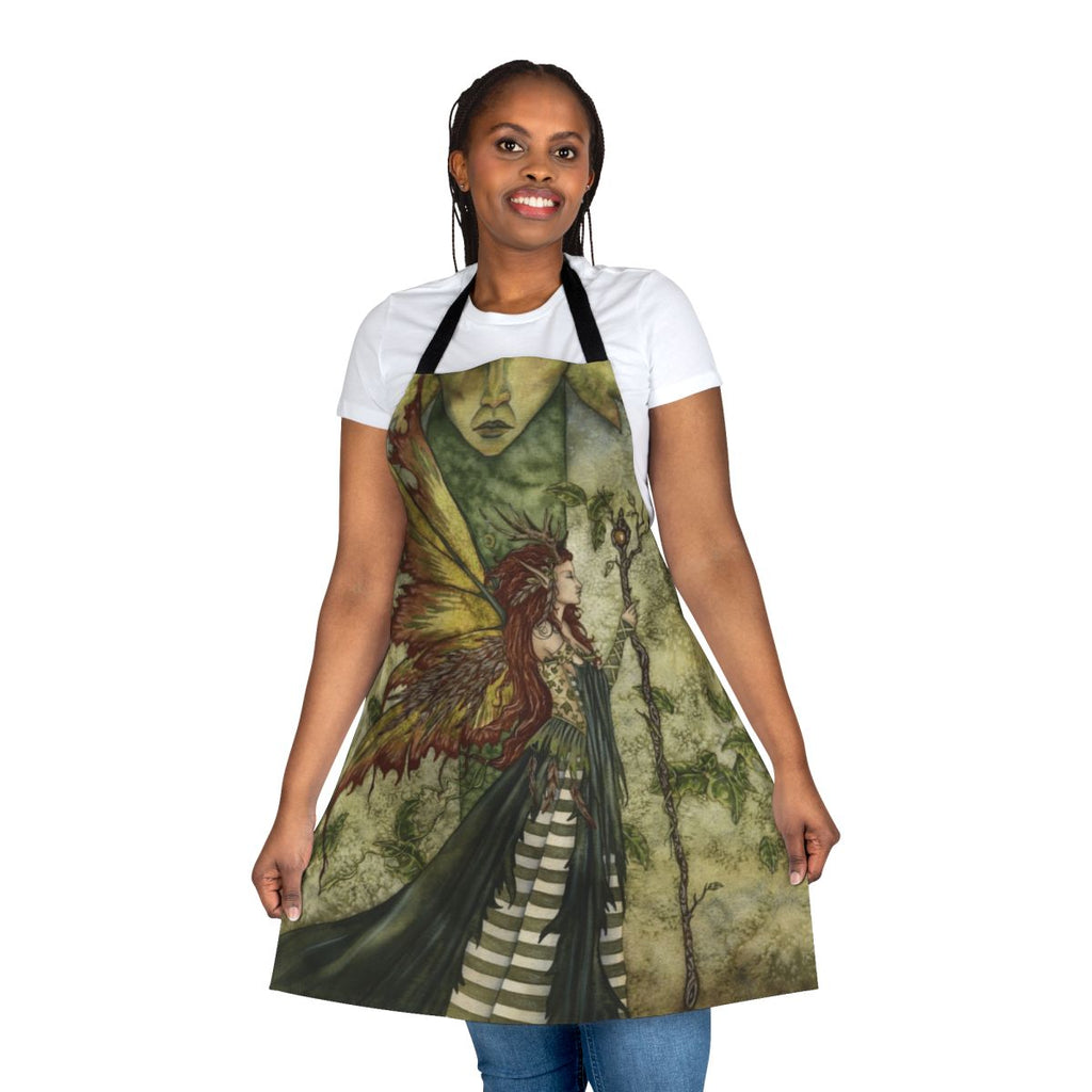 A beautiful green apron featuring a fairy design, perfect for the nature-loving homemaker.
