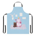 A whimsical apron featuring a family portrait with a dog, unicorn, and other cute, playful elements.