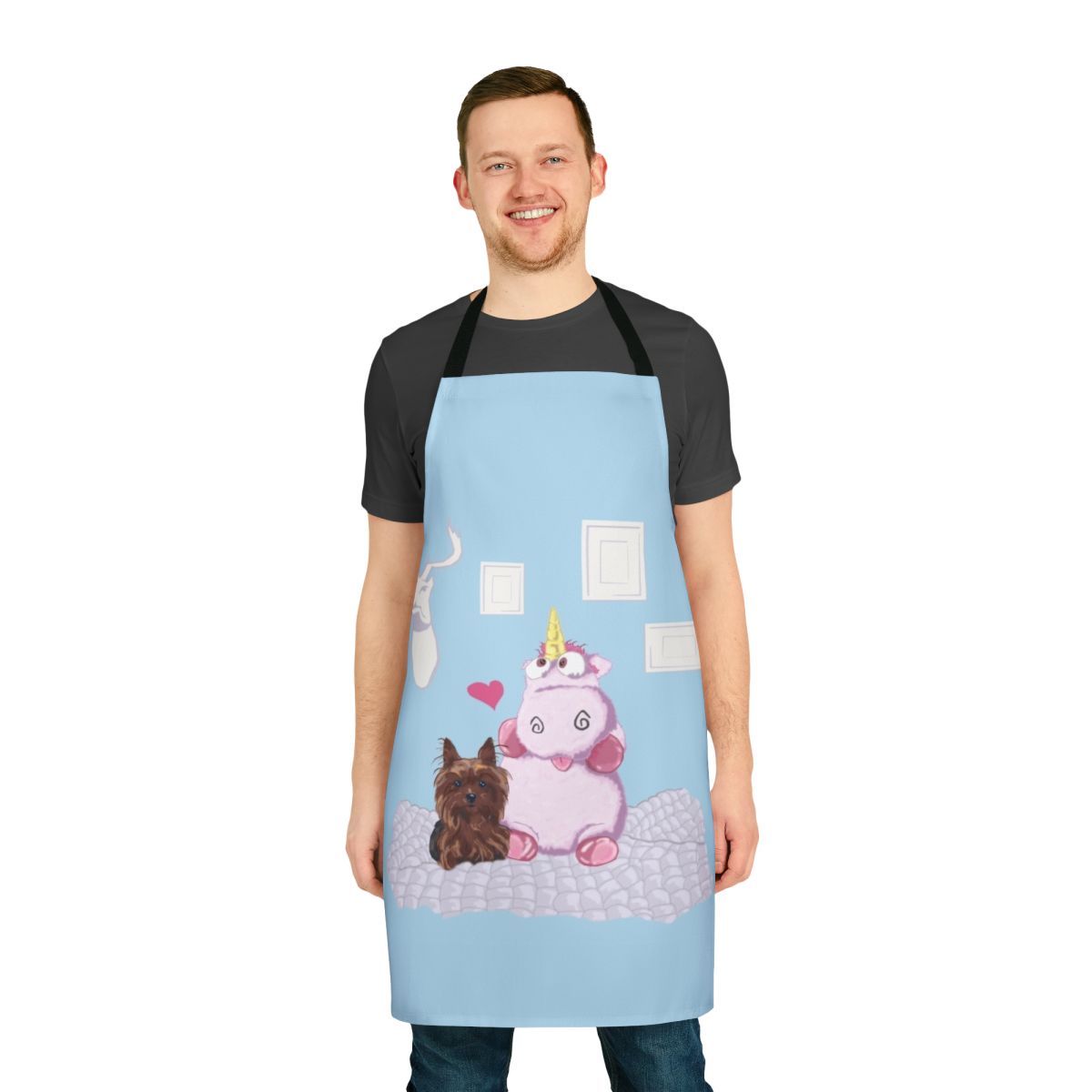A whimsical apron featuring a family portrait with a dog, unicorn, and other cute, playful elements.