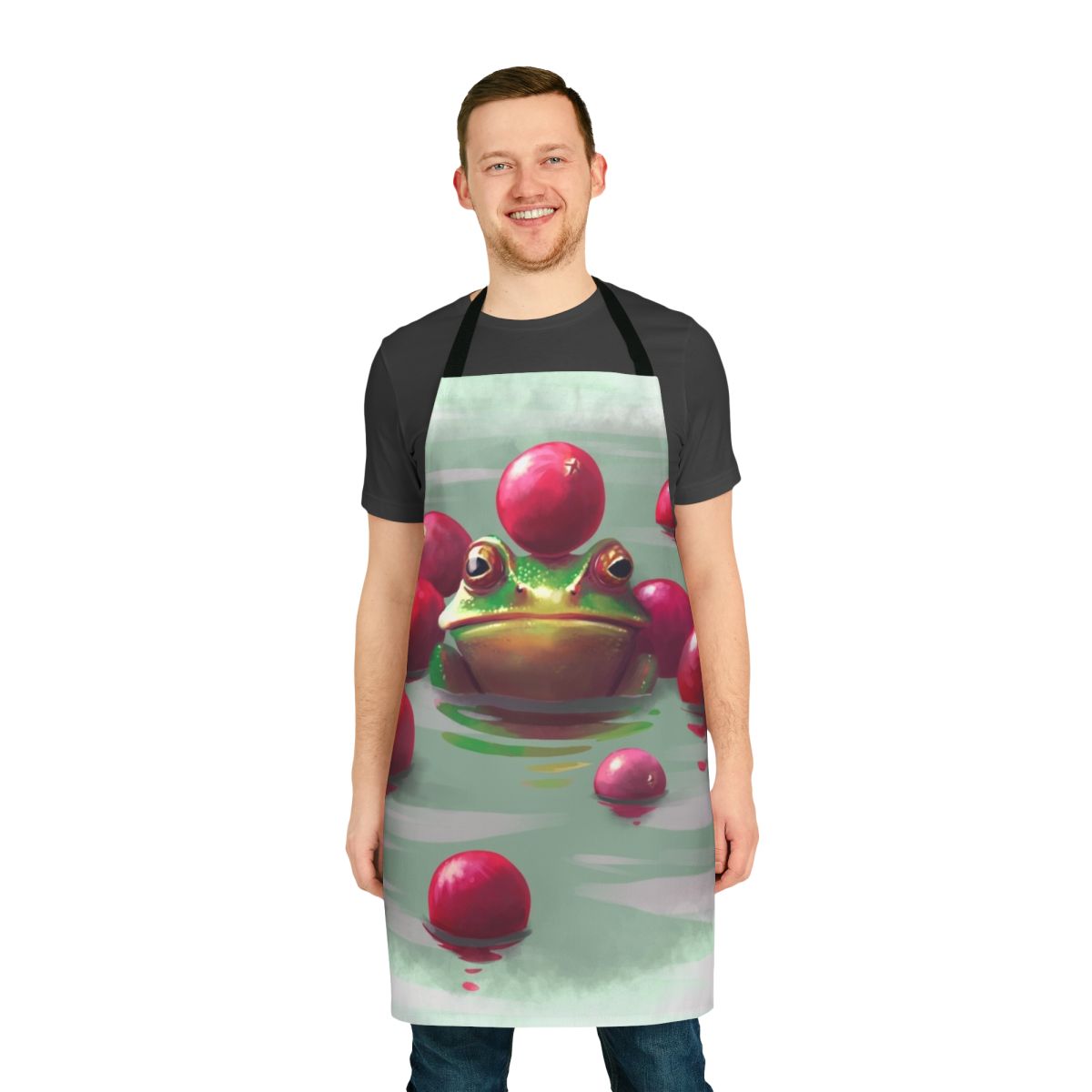 Colorful apron featuring a frog surrounded by cranberries, perfect for fall baking and cooking