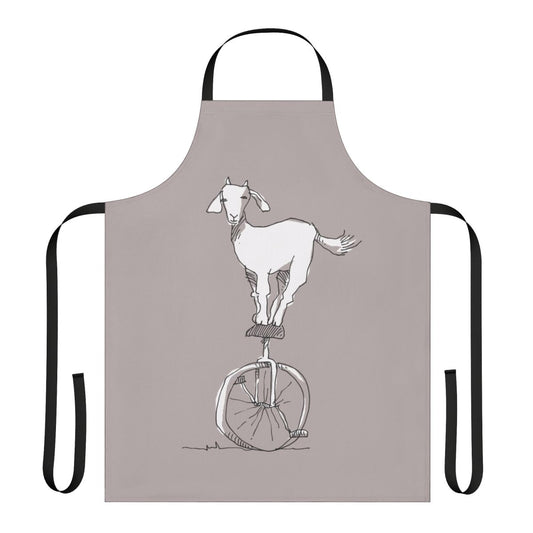 A charming apron featuring a goat riding a unicycle, a quirky and unusual design.