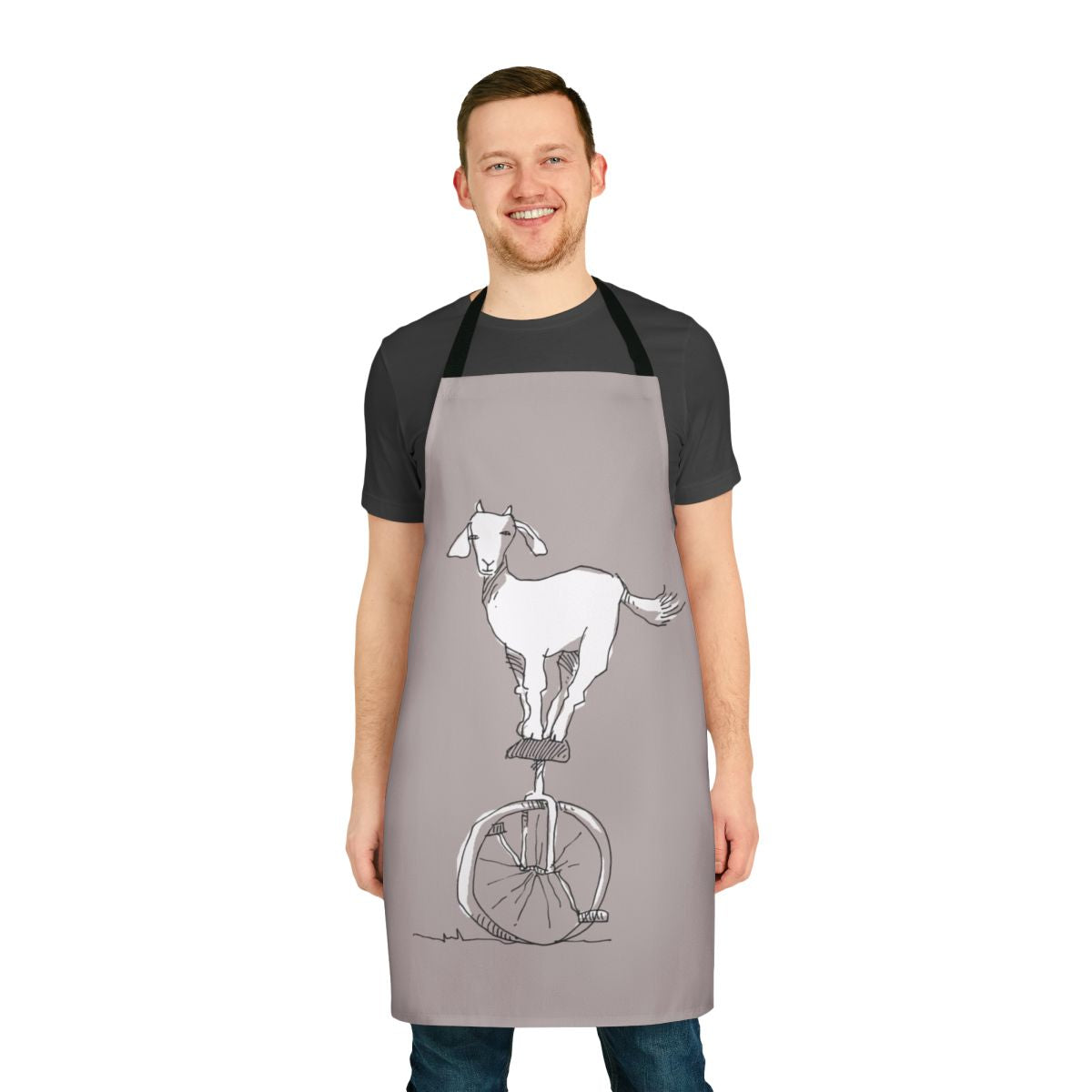 A charming apron featuring a goat riding a unicycle, a quirky and unusual design.