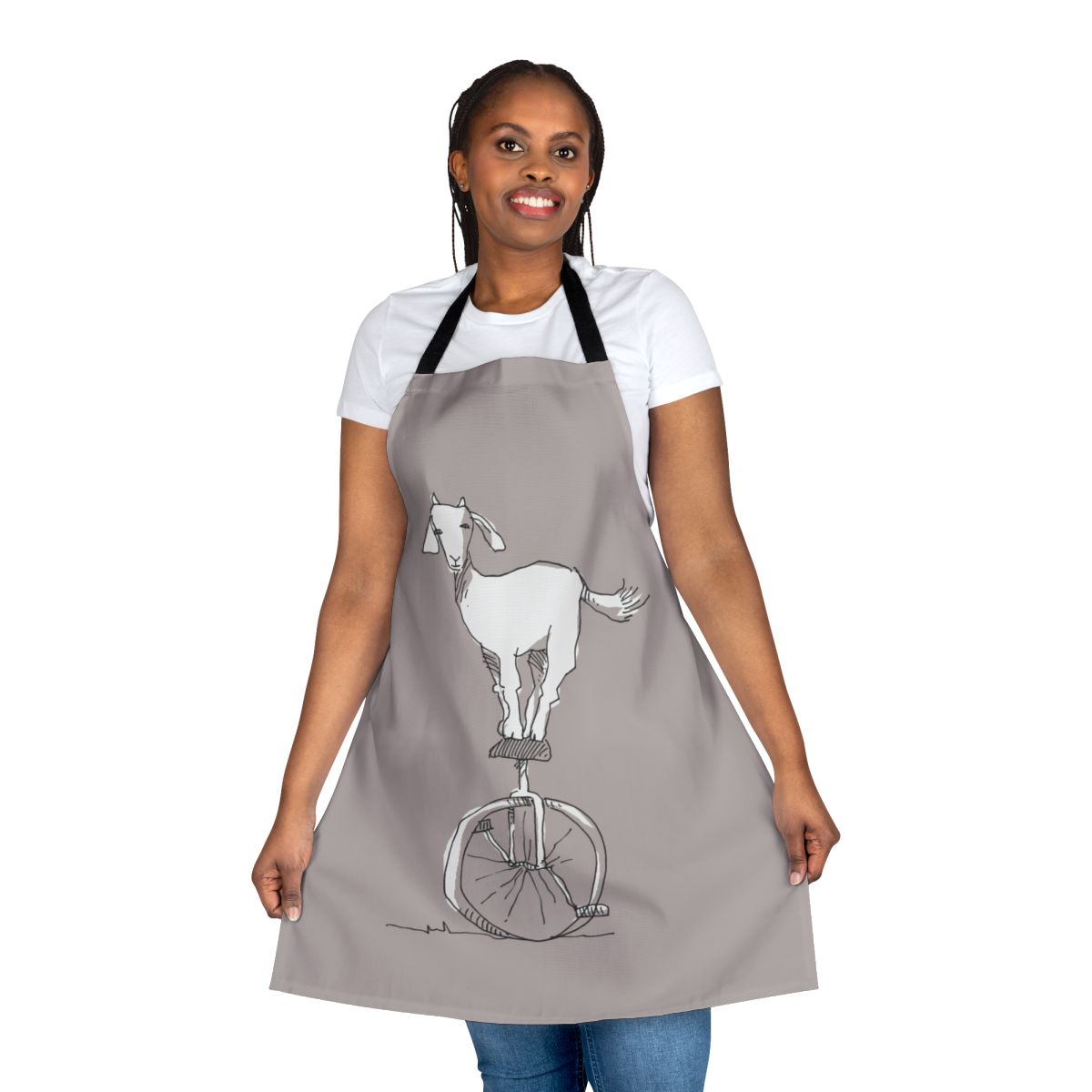 A charming apron featuring a goat riding a unicycle, a quirky and unusual design.
