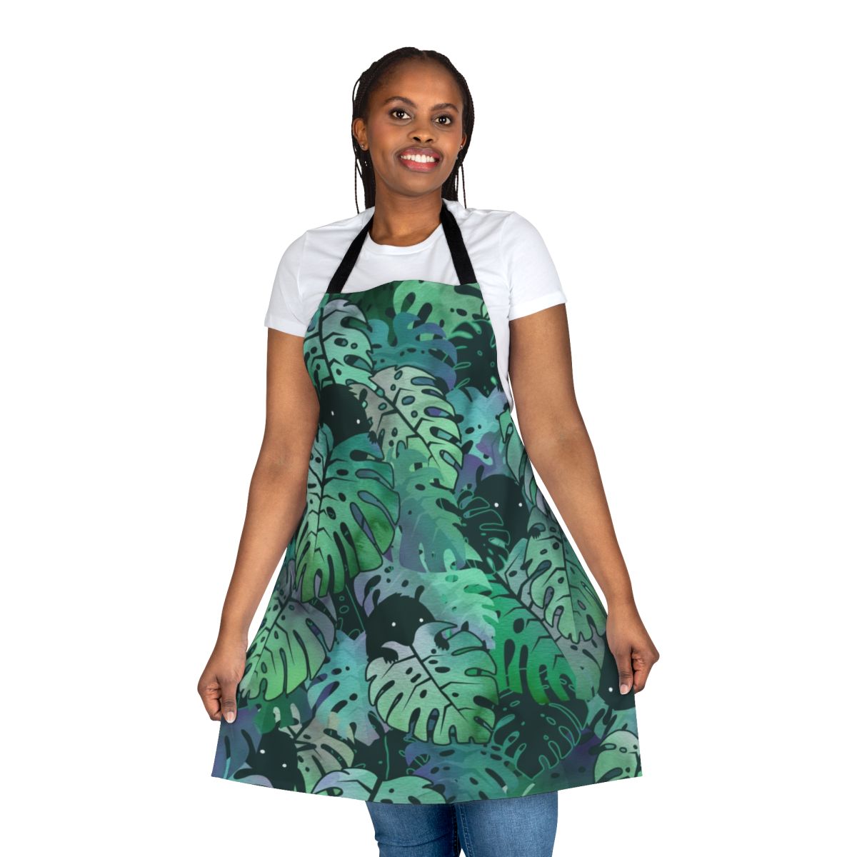 Colorful monstera leaf pattern printed on a white apron