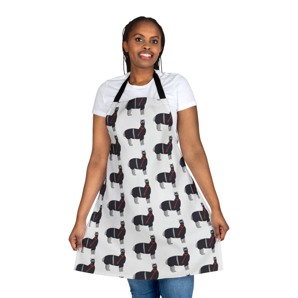 A black and white apron featuring a cartoon llama dressed as a ninja.