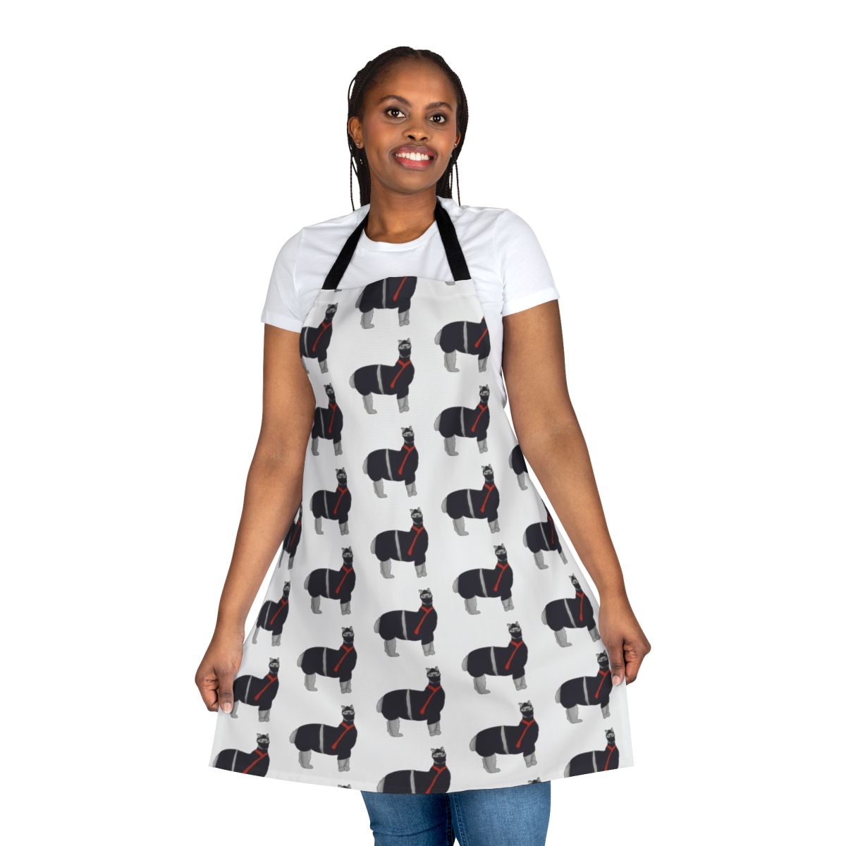 A black and white apron featuring a cartoon llama dressed as a ninja.