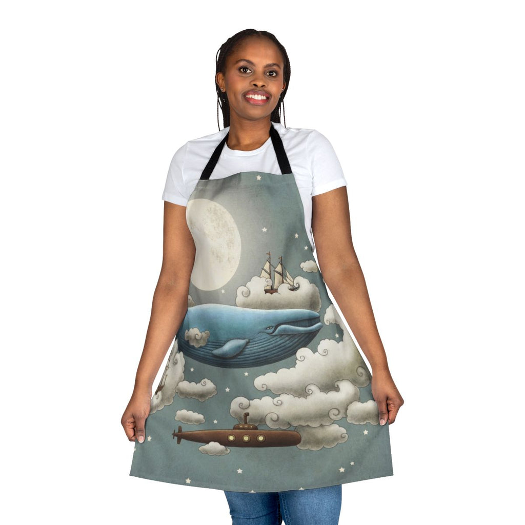Digital illustration of an apron featuring a whimsical, nautical scene with an ocean, sky, and various elements like a blue whale, tall ships, and a submarine.