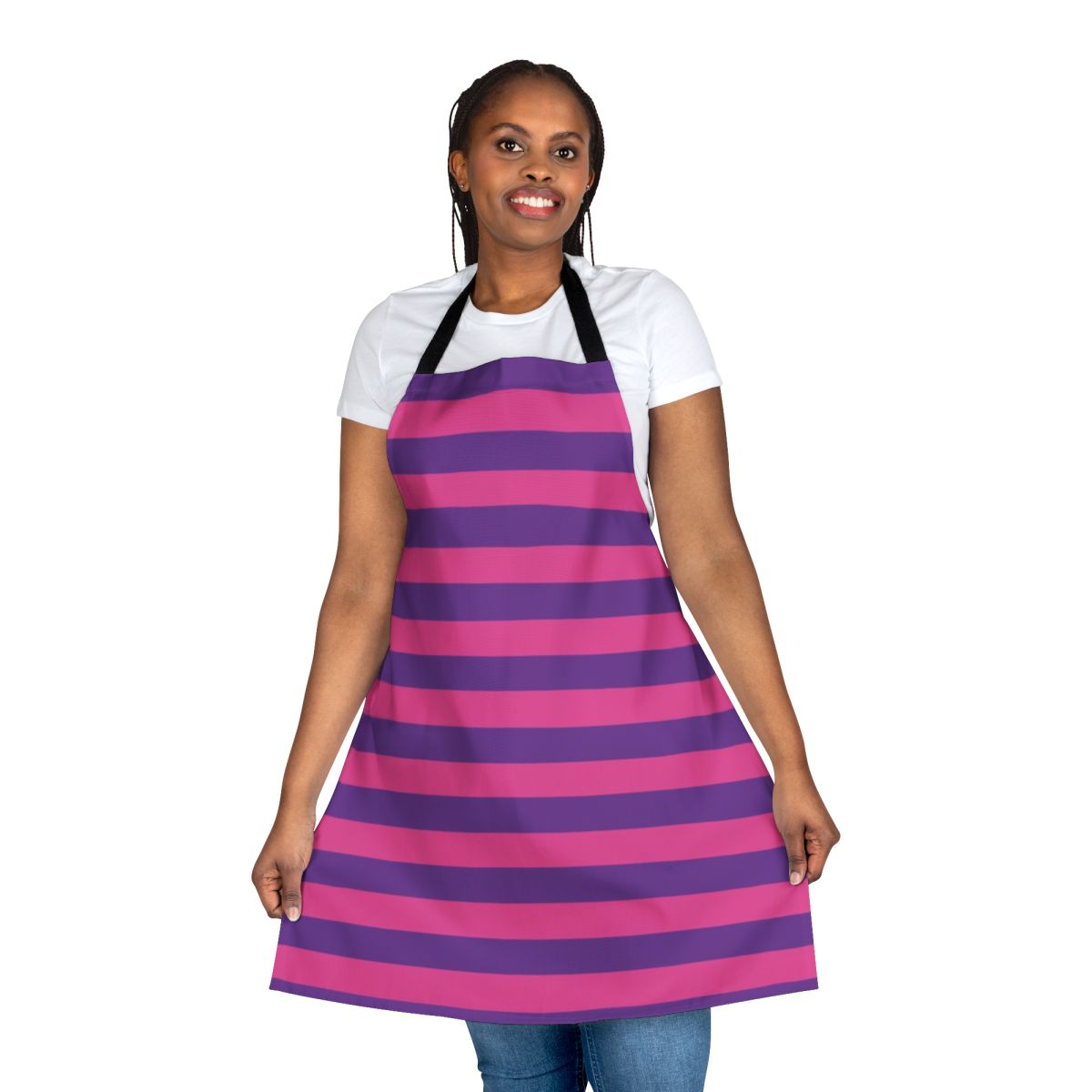 Pink and purple striped apron with a cheshire cat design